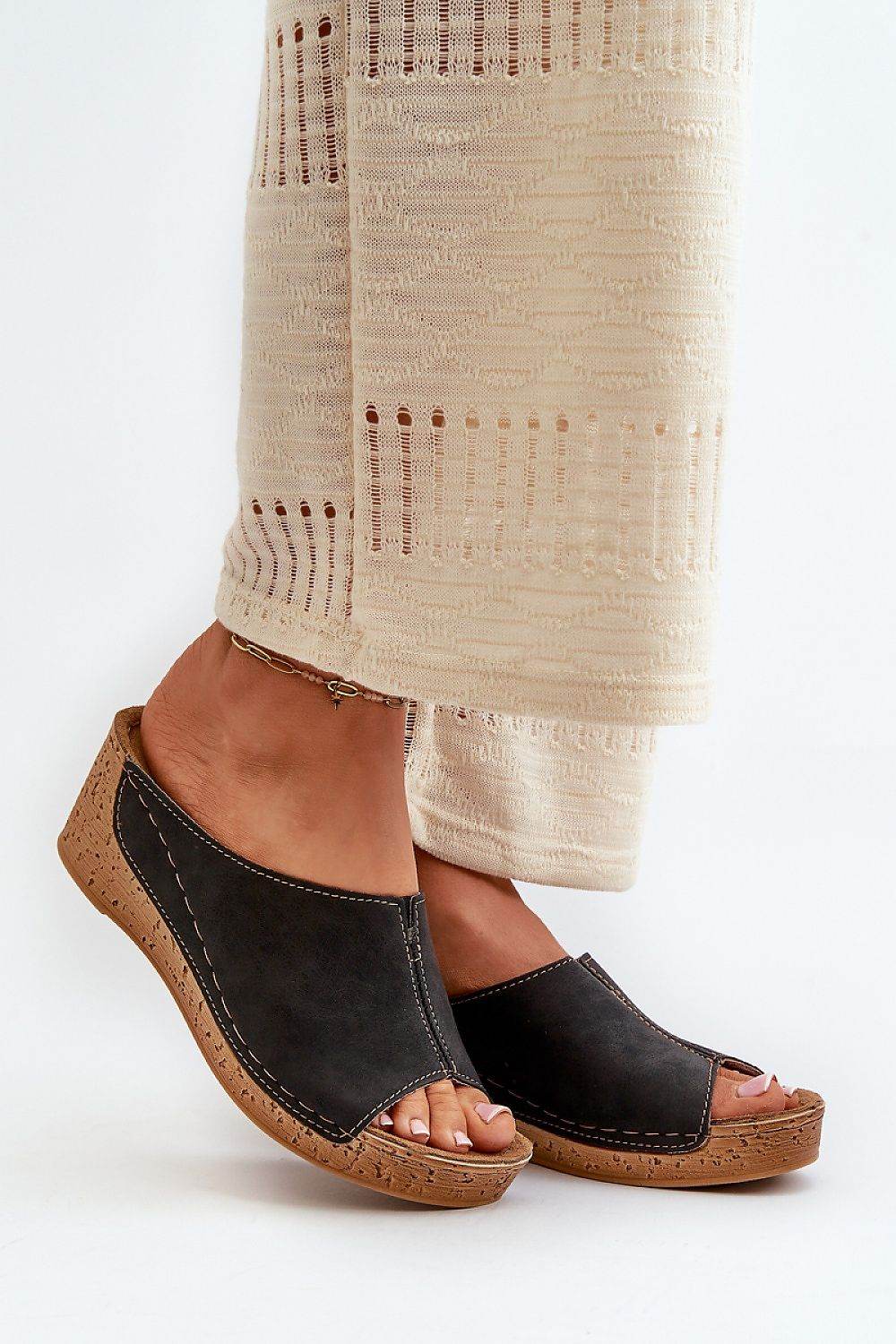 Clacquettes Step in style - Ostensia