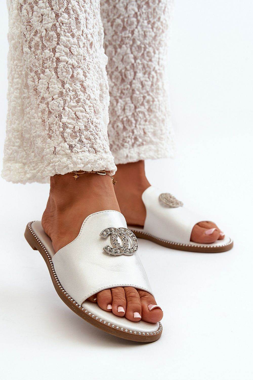 Clacquettes Step in style - Ostensia