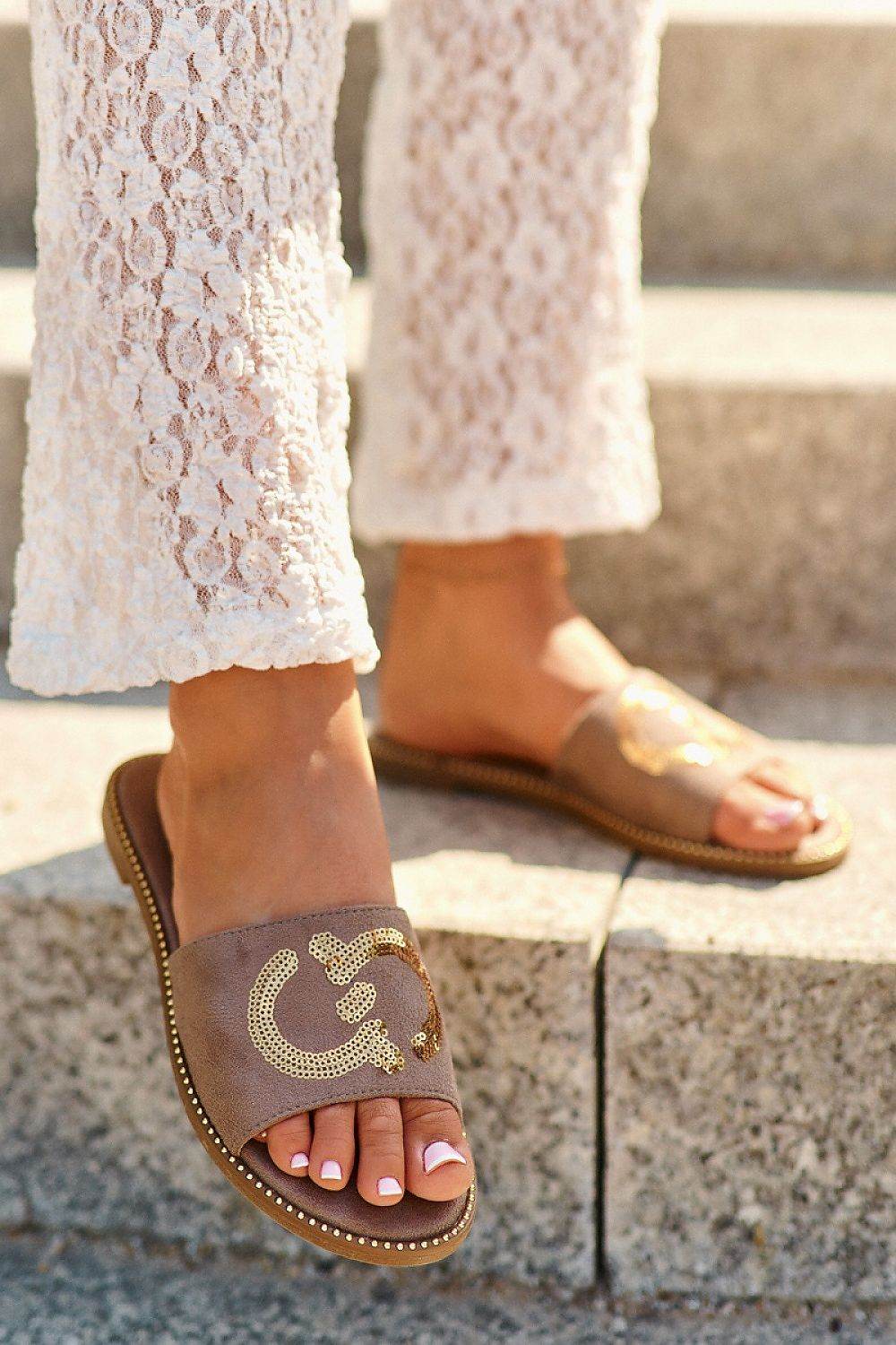 Clacquettes Step in style - Ostensia
